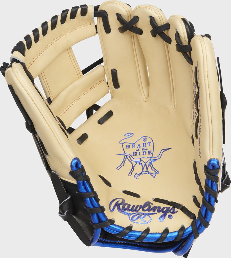 Camel palm of a Rawlings Heart of the Hide infield glove with a royal palmR stamp and black laces - SKU: PRONP4-2C
