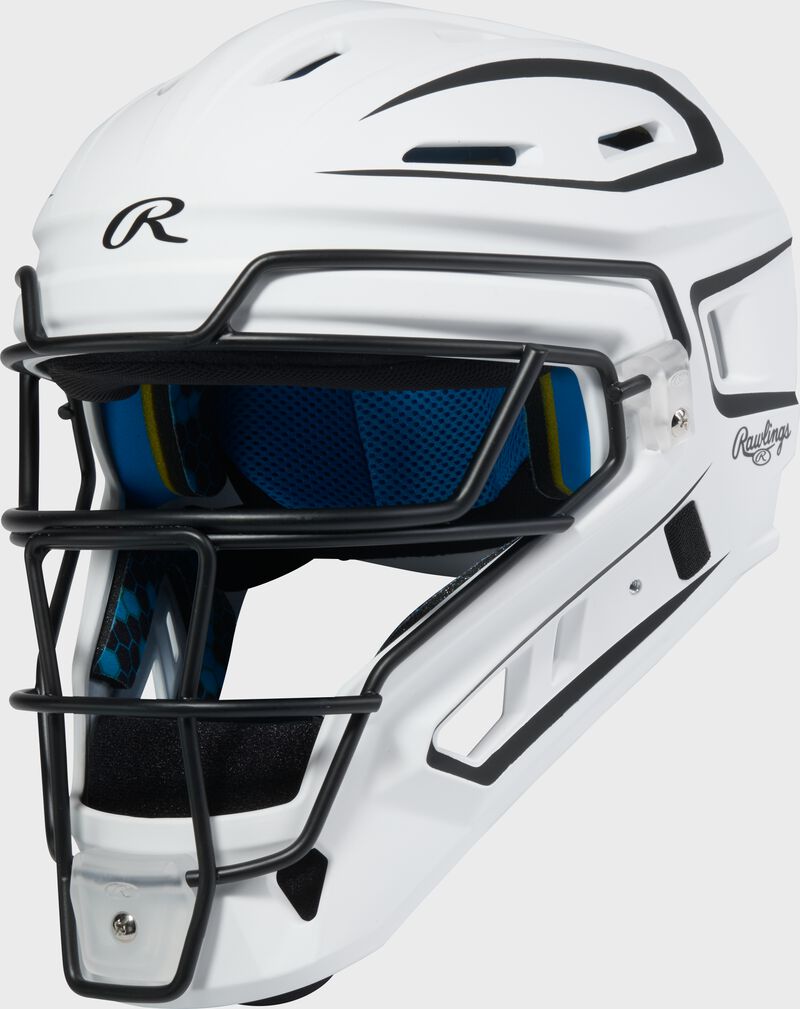 Front left of a white Rawlings Mach Pro Series catcher's helmet loading=