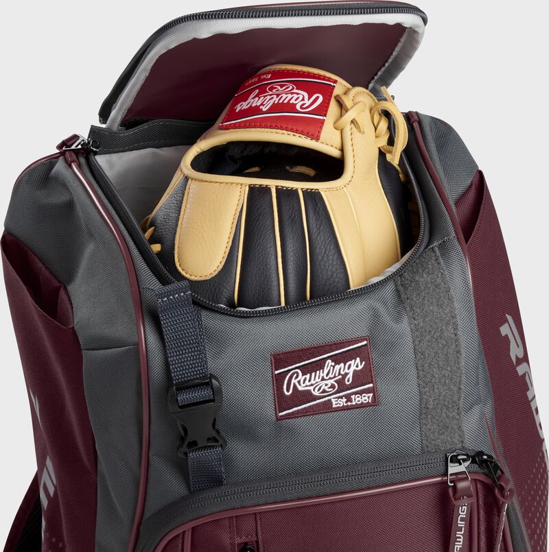 A Rawlings baseball glove in the top compartment of a Franchise baseball backpack - SKU: FRANBP-MA