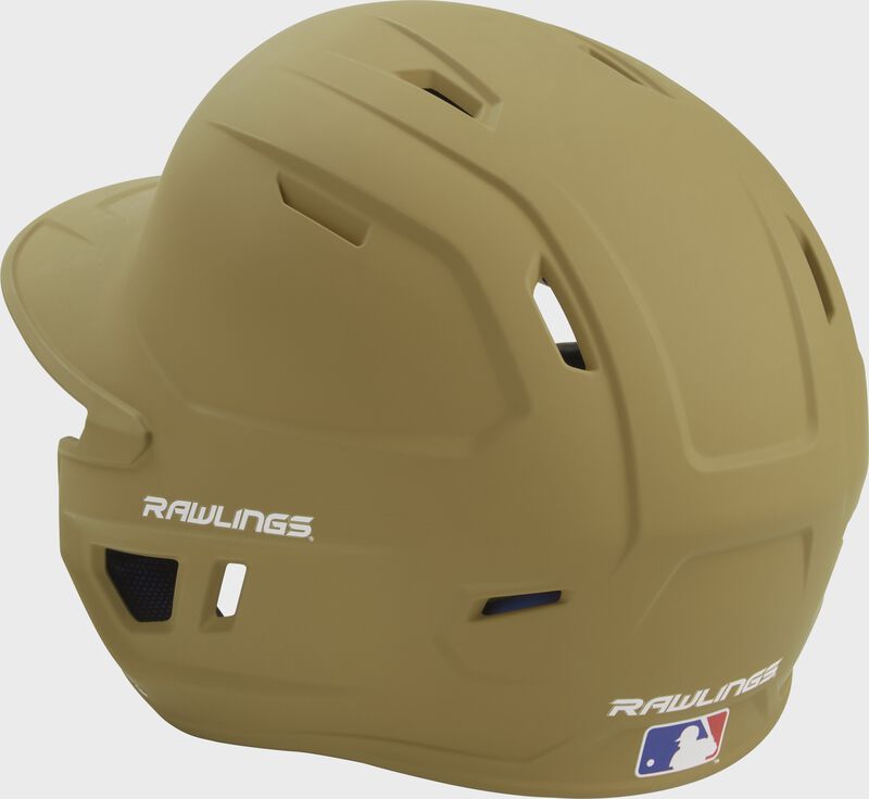 Back left view of a matte Vegas gold MACH series batting helmet with air vents