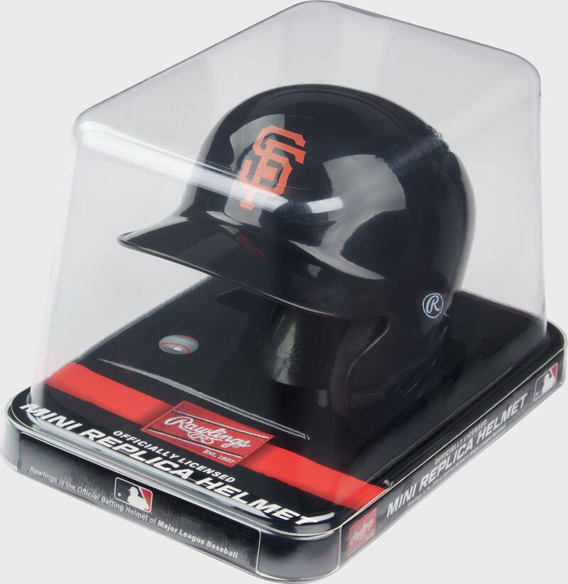 A black Giants mini helmet in a clear packaging case