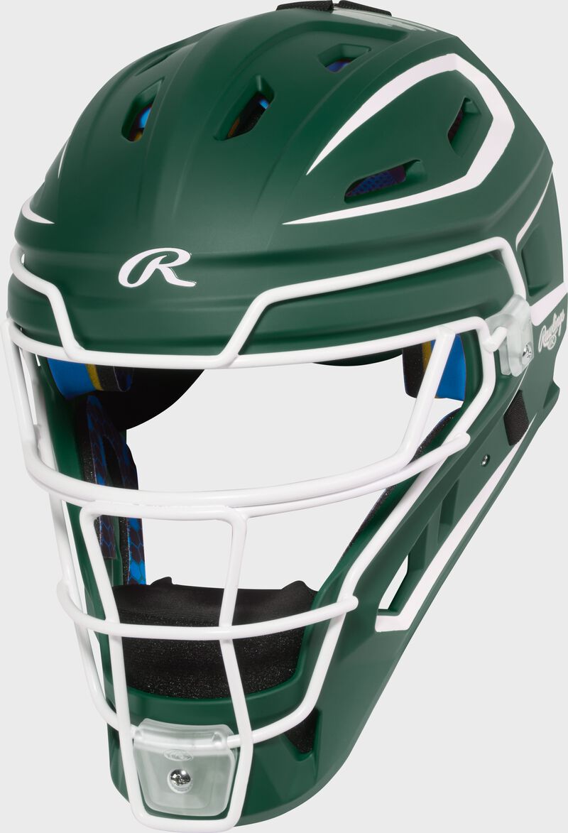 Front left of a dark green Rawlings Mach Pro Series catcher's helmet loading=