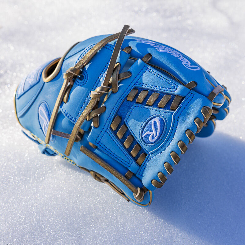 Picture of the Columbia blue web with gold laces of a exclusive R2G Heart of the Hide 11.75" glove