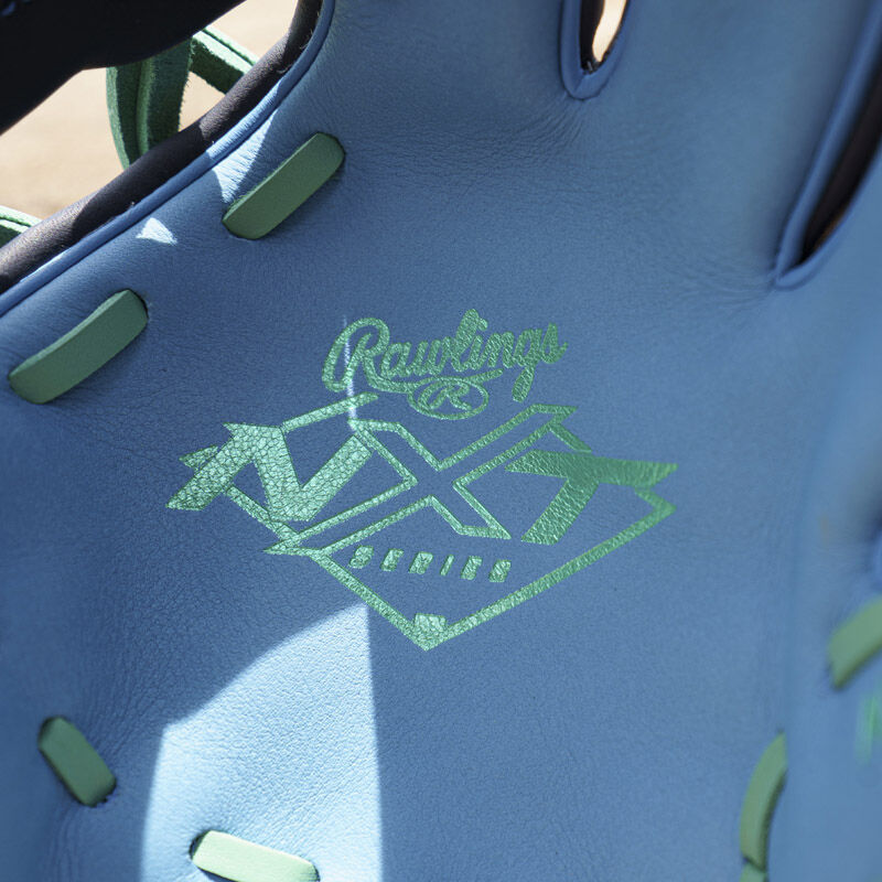 Picture of the mint Rawlings NXT Series logo stamped on the columbia blue leather palm of an exclusive Rawlings NXT Series 11.5" infield glove