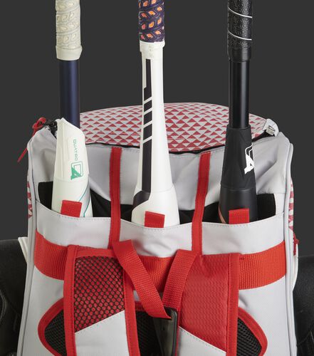 Bat compartment of a white/scarlet R800 fastpitch softball bag holding 3 bats