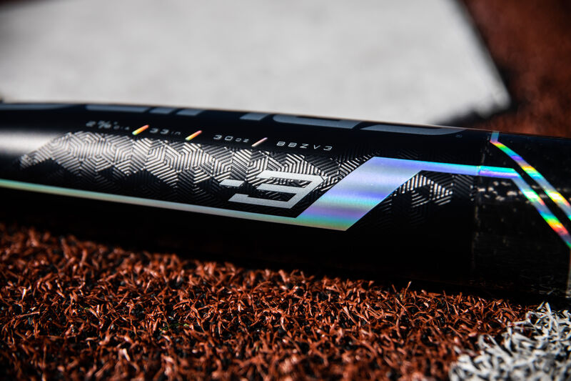 Barrel of a 2020 Velo ACP baseball bat lying next to home plate - SKU: BBZV3