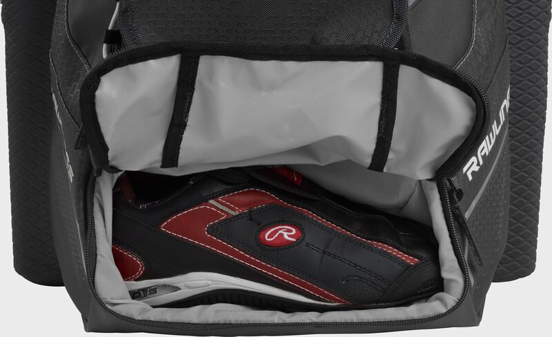 A graphite Rawlings baseball backpack with a cleat in the bottom cleat storage compartment - SKU: IMPLSE-GR