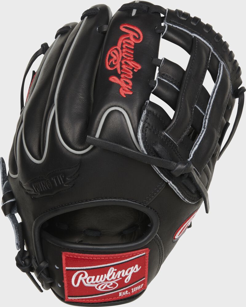 Black Wing Tip back of a Heart of the Hide 11.75" infield glove with a red Rawlings patch - SKU: PROT205W-6B
