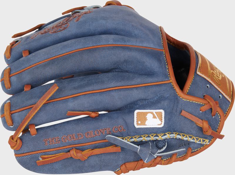 Back of a Heart of the Hide Pro Label Denim infield glove with the MLB logo on the pinky