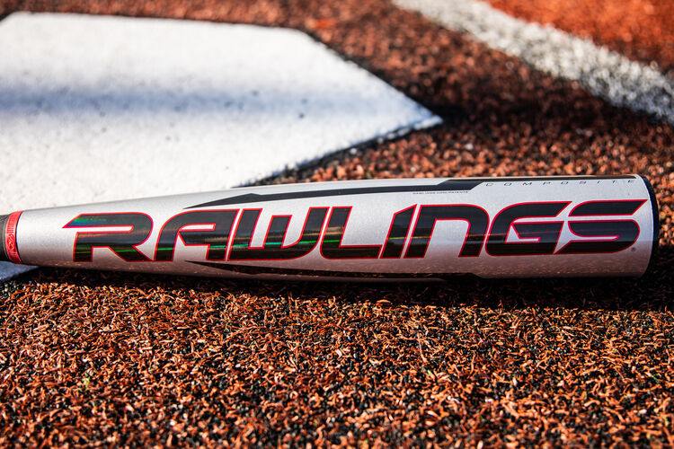Black/red Rawlings logo on a gray Quatro Pro -8 USA Baseball bat next to home plate - SKU: US1Q8