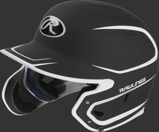 Left angle view of a MACHEXTR Rawlings Mach EXT Junior helmet with a two-tone matte black/white shell