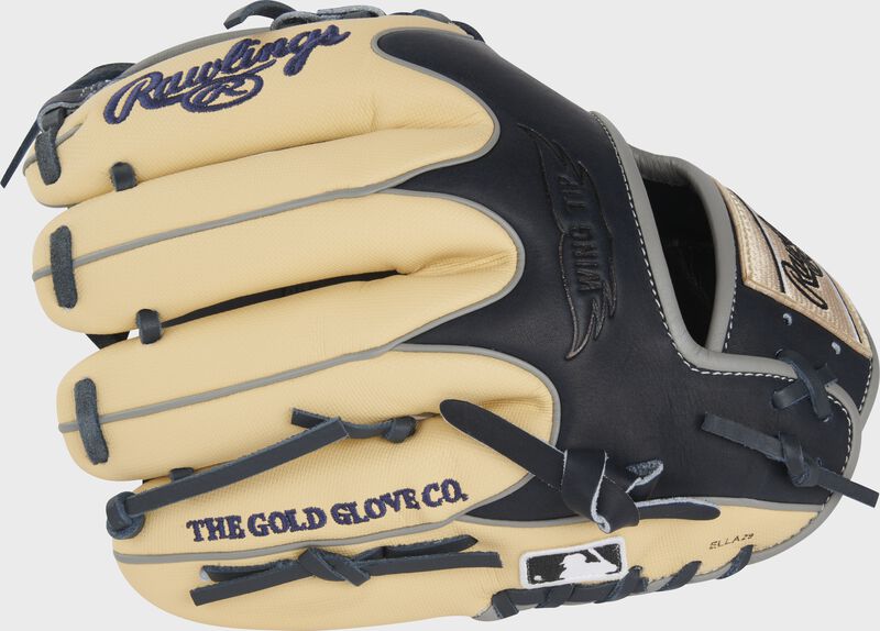 Camel Speed Shell/Black Wing Tip back of a Heart of the Hide ColorSync 8.0 11.5" infield glove with the MLB logo on the pinky - SKU: PRO204W-2XNSS
