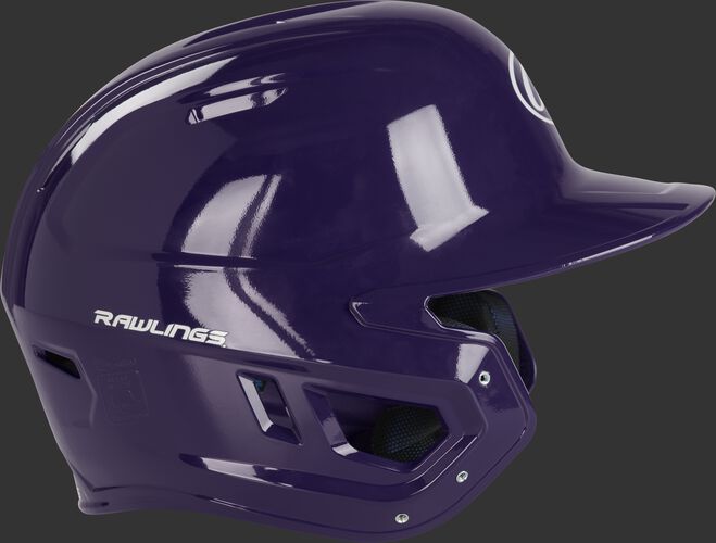 Right side ear flap of a MCH01A Rawlings Mach baseball batting helmet with a purple shell