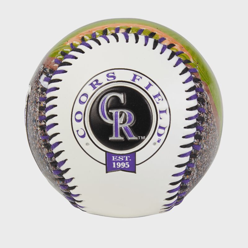 Colorado Rockies team logo on a MLB stadium baseball