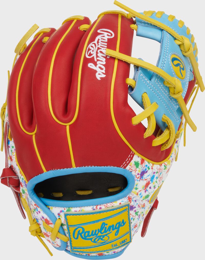 Scarlet back of a Heart of the Hide 11.5-Inch Splatter Infield Glove with a yellow Rawlings patch