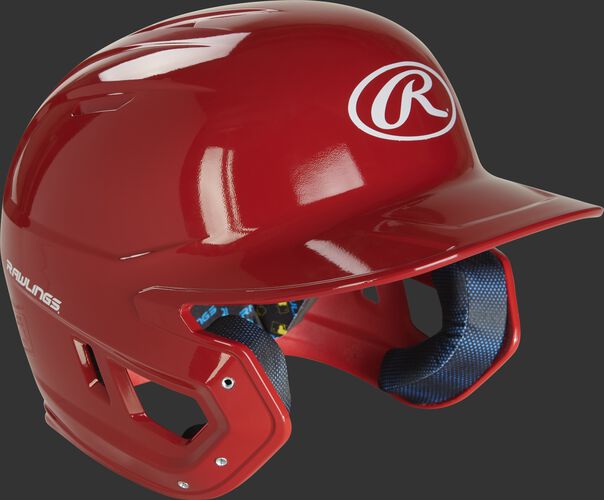 Right angle view of a MCC01 Rawlings Mach helmet with a gloss scarlet shell