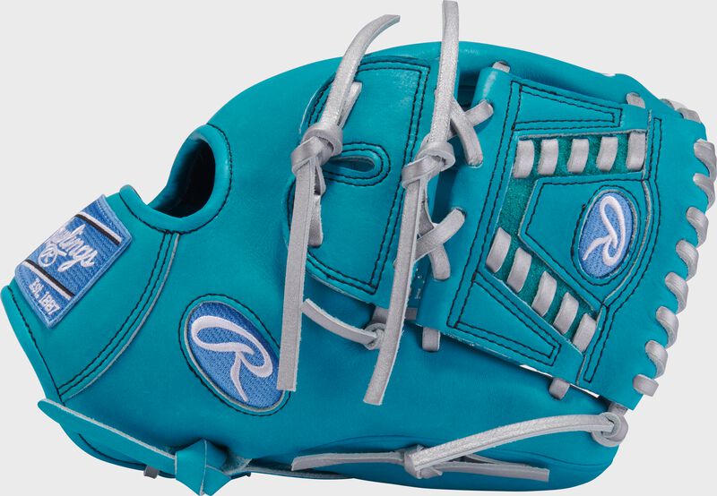 Thumb of a teal Rawlings Heart of the Hide 11.75-Inch Infield/Pitcher's Glove with a laced 2-piece solid web