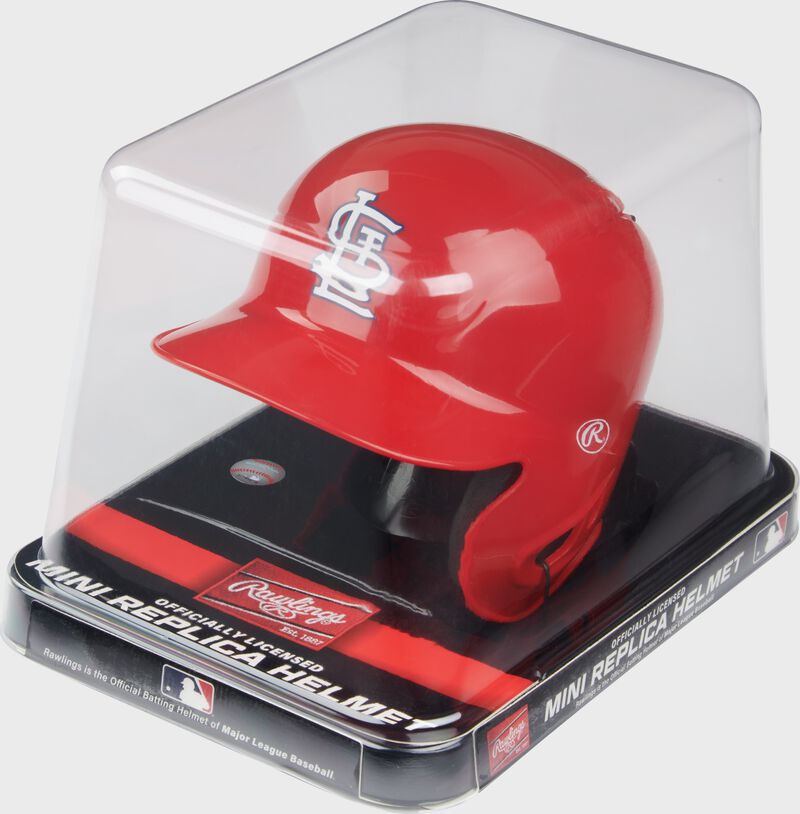 A red Cardinals mini replica helmet in a clear packaging case