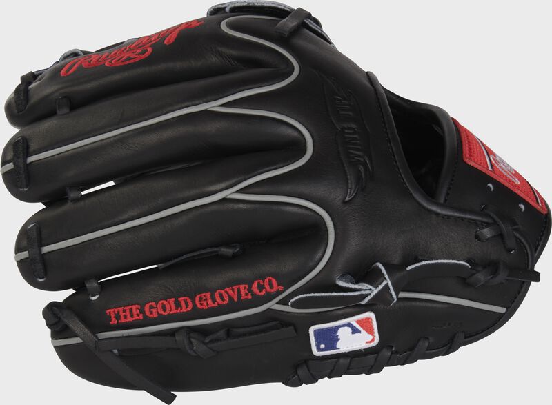 Black back of a Heart of the Hide 11.75" Wing Tip glove with the MLB logo on the pinky - SKU: PROT205W-6B loading=