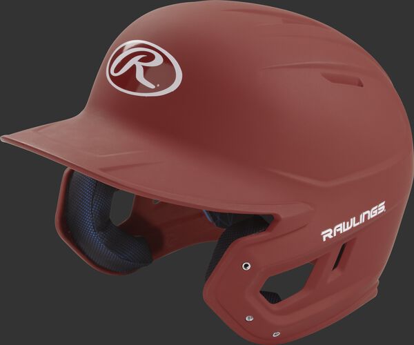 Left angle view of a Rawlings MACH helmet with a one-tone matte cardinal shell