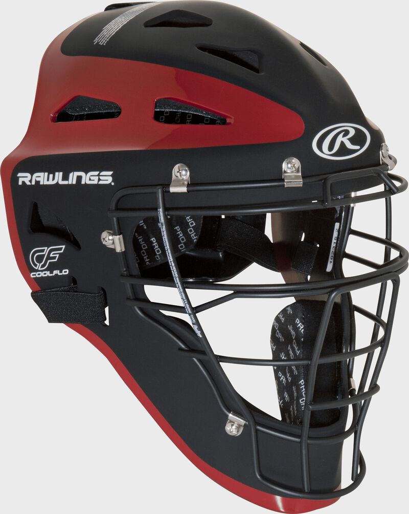 Front right of a black/scarlet CHVEL Rawlings Velo adult catcher's helmet