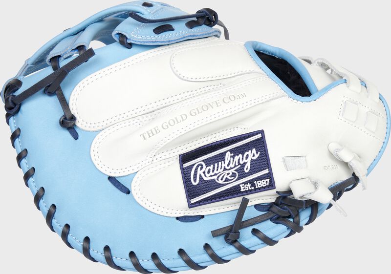Back of a white/Columbia blue 34-Inch Liberty Advanced Color Series catcher's mitt with a navy Rawlings patch - SKU: RLACM34FPWCBN