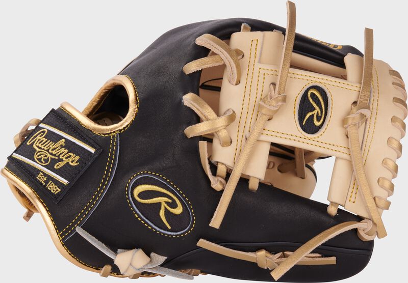 Thumb of a black/camel exclusive 11.5" Heart of the Hide ContoUR fit infield glove with a camel I-web