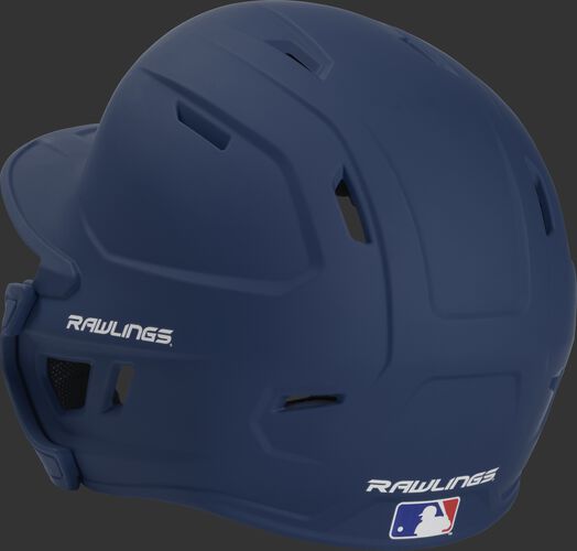 Back left view of a matte navy MACHEXTR MACH series batting helmet with air vents