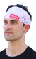 A guy wearing a pink stitch multi-functional neck gaiter as a head band - SKU: RC40001-681 image number null