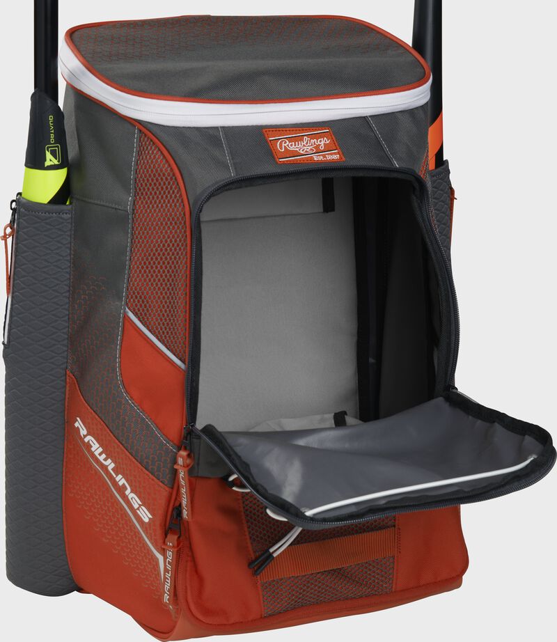 Front of an orange Rawlings Impulse backpack with the main compartment open - SKU: IMPLSE-BO