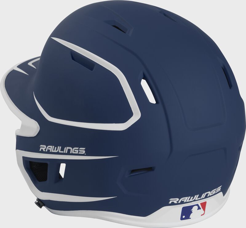 Back left view of a matte navy/white MACHEXTR MACH series two-tone batting helmet with air vents