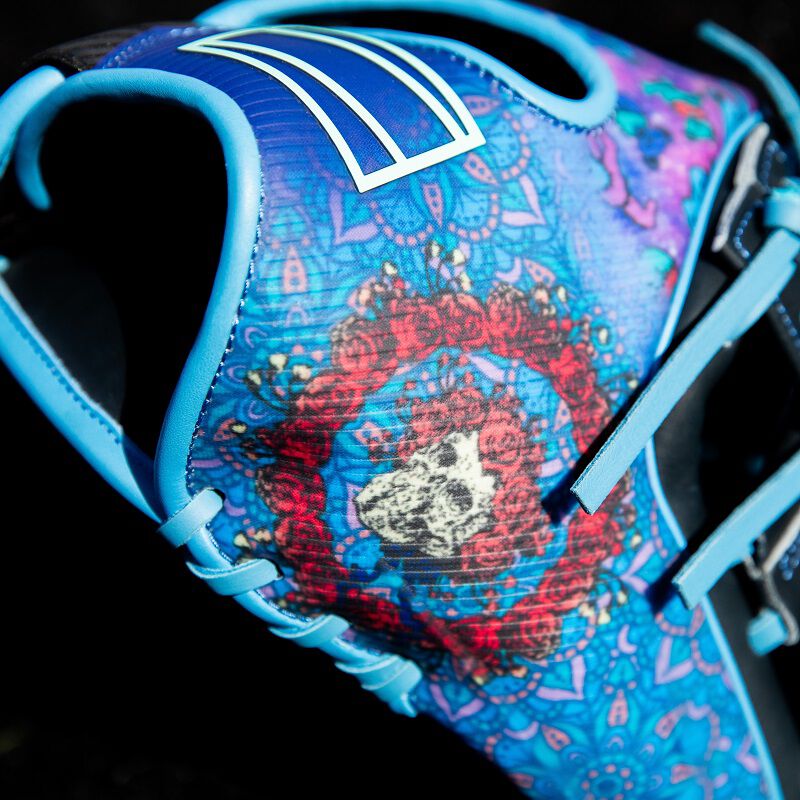 Picture of the sublimated design on the thumb of a Rawlings Grateful Dead REV1X infield glove