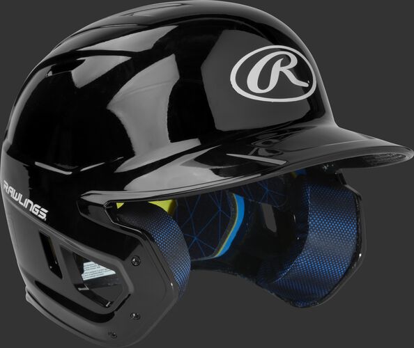 Right angle view of a matte MACH batting helmet with a black shell