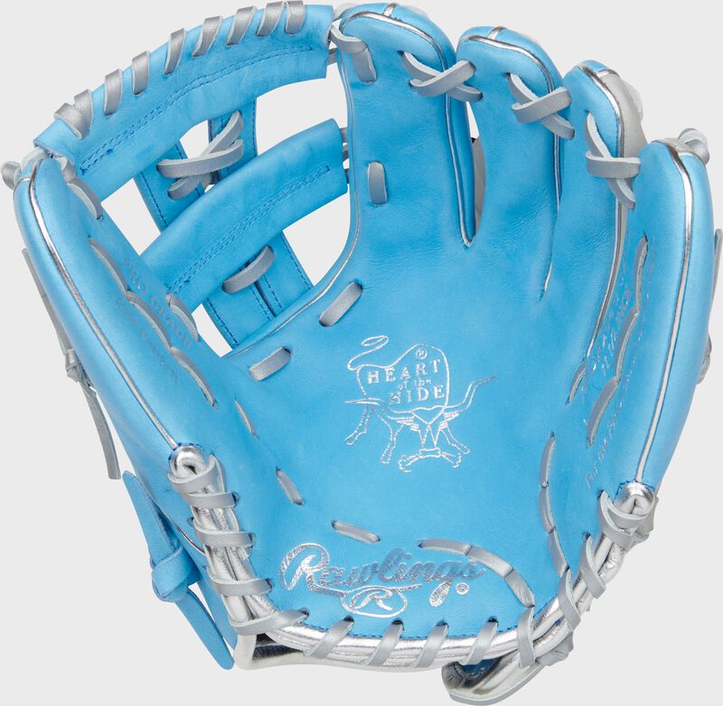 Columbia blue palm of a Rawlings Heart of the Hide ContoUR Fit glove with silver laces and silver stamping