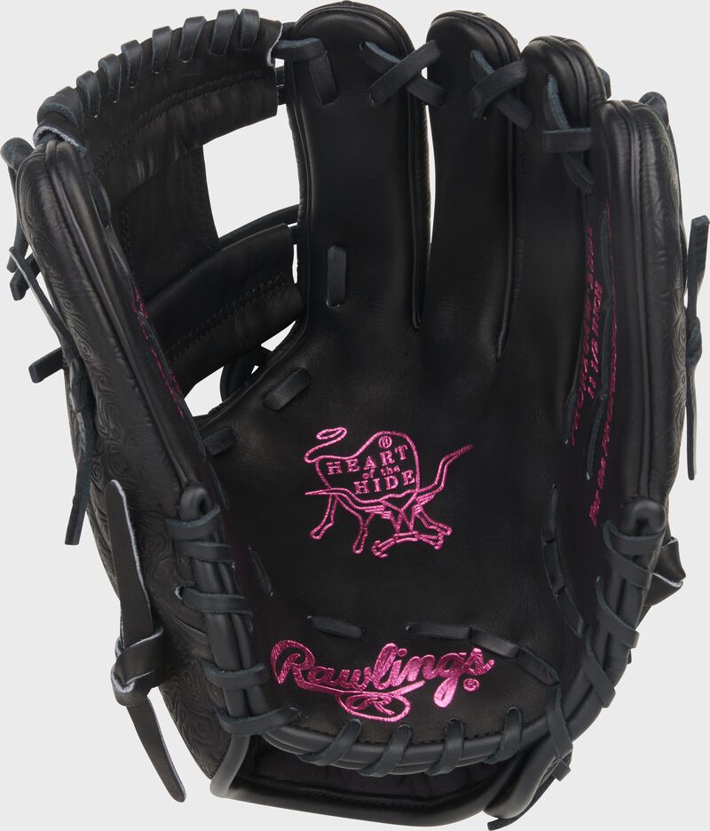 Black palm of a Rawlings Heart of the Hide 11.5-Inch Wing Tip infield glove with pink stamping and black laces