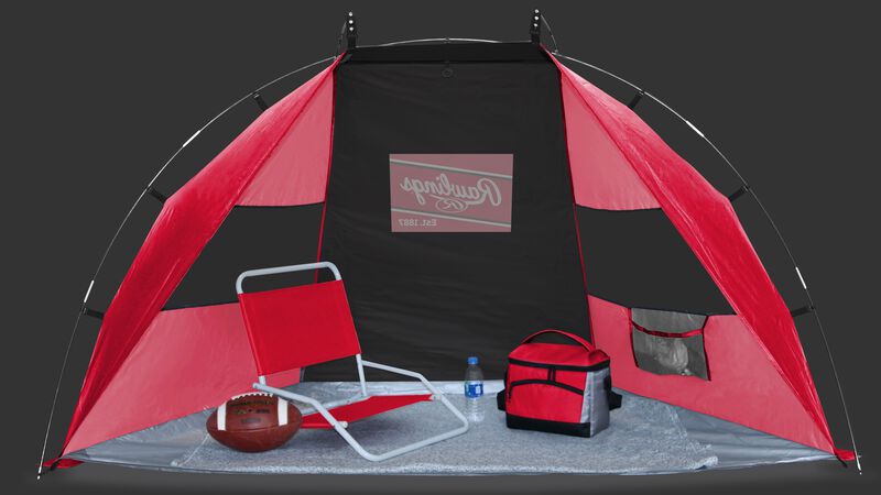 A red/black Rawlings sun shelter with a chair and cooler inside - SKU: 00974043511