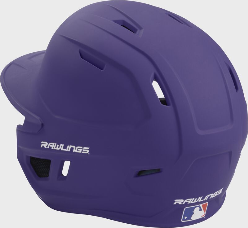 Back left view of a matte purple MACH series batting helmet with air vents