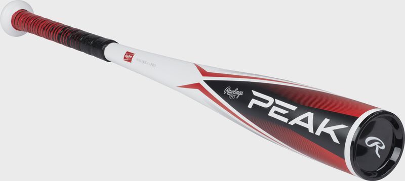 Front angle view of a white/black Rawlings Peak USSSA coach pitch bat with a black end cap - SKU: RUT4P11