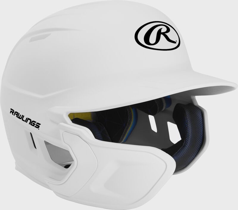Right angle view of a matte white MACHEXTL Mach Junior helmet with Mach EXT left hand batter face guard extension loading=