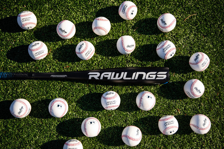 Rawlings logo on the barrel of a -5 5150 USA bat on a field surrounded by baseballs - SKU: US155