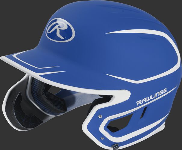 Left angle view of a MACHEXTR Rawlings Mach EXT Senior helmet with a two-tone matte royal/white shell