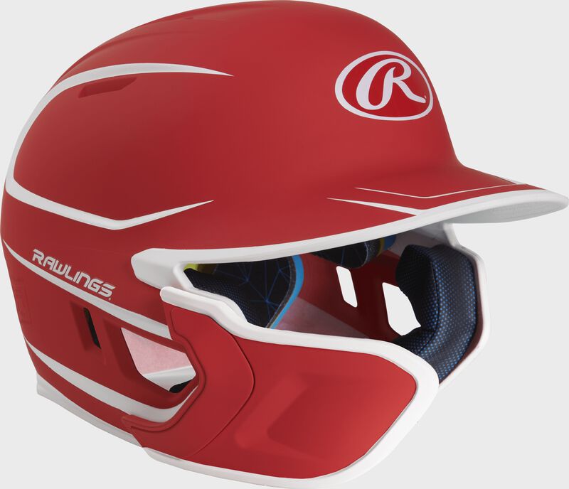 Right angle view of a matte scarlet/white MACHEXTR Mach Junior helmet with Mach EXT left hand batter face guard extension