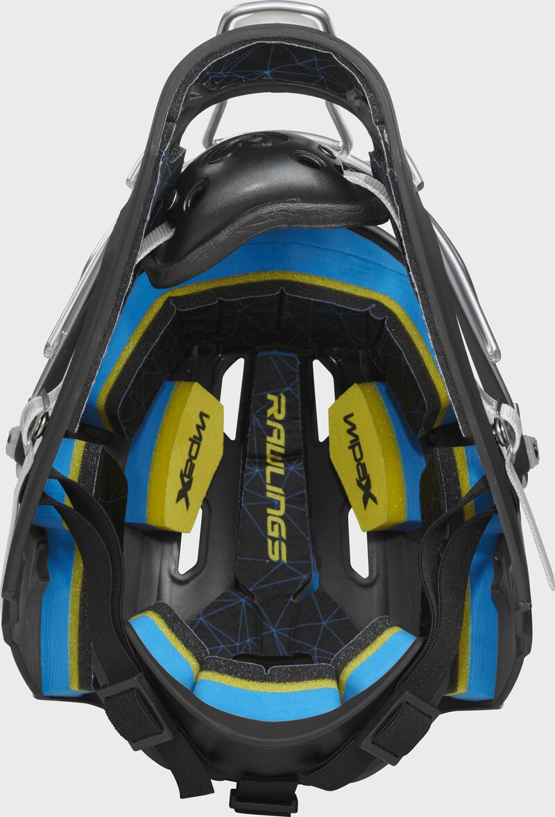 Inside IMPAX foam padding of a black/white CHMCHS Rawlings catcher's helmet