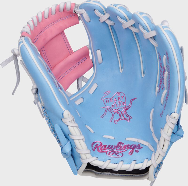Columbia blue palm of a Rawlings Heart of the Hide infield glove with pink stamping and white laces