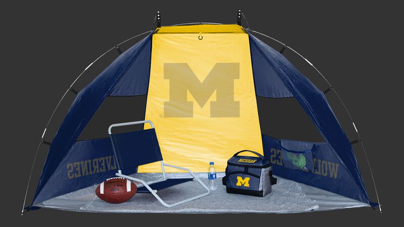 Back of a Michigan Wolverines sideline sun shelter with a Michigan logo in the middle set up on a field - SKU: 00973083111