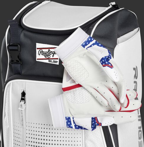 Two batting gloves hanging on the front Velcro strap of a Franchise baseball backpack - SKU: FRANBP-W