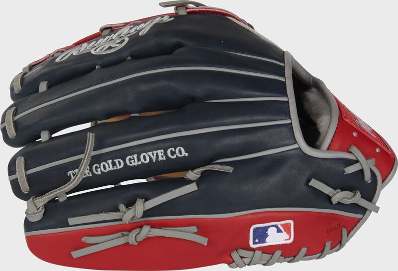 Navy/scarlet back of a Ronald Acuna Pro Preferred 12.75" outfield glove with the MLB logo on the pinky - SKU: PROSRA13C