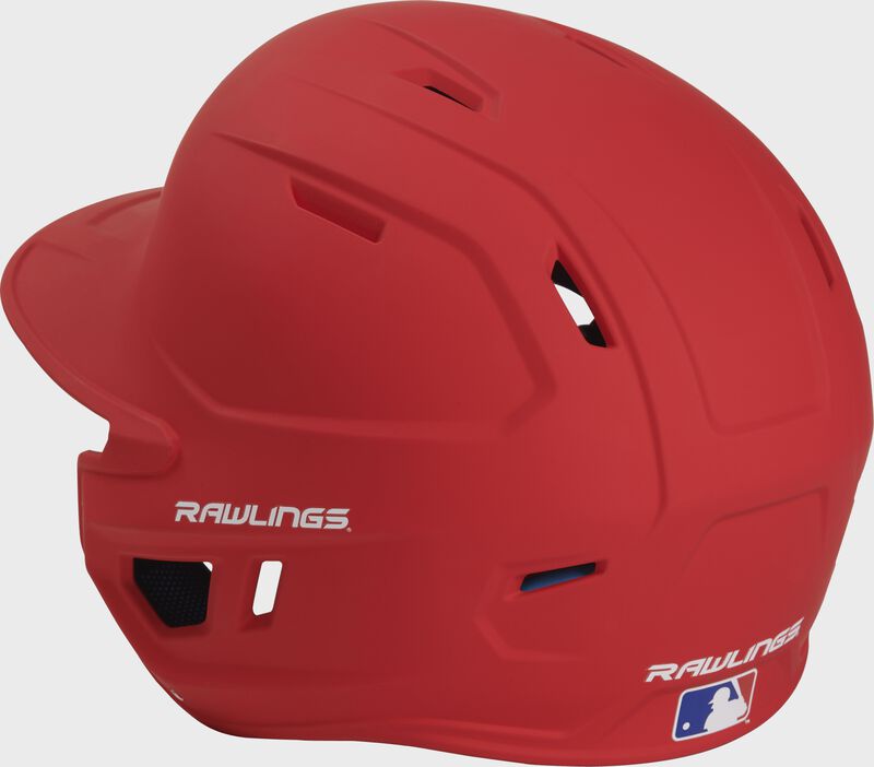 Back left view of a matte scarlet MACHEXTL MACH series batting helmet with air vents loading=