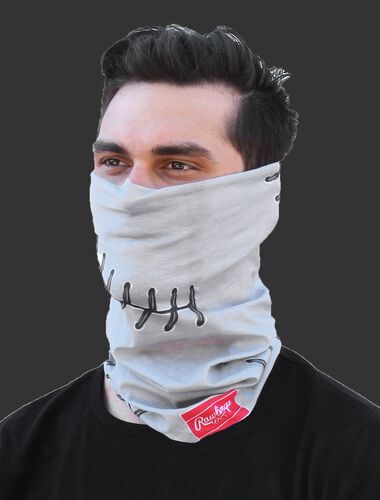A guy wearing a gray baseball stitch Rawlings multi-functional head and face cover over his mouth and nose - SKU: RC40001-020