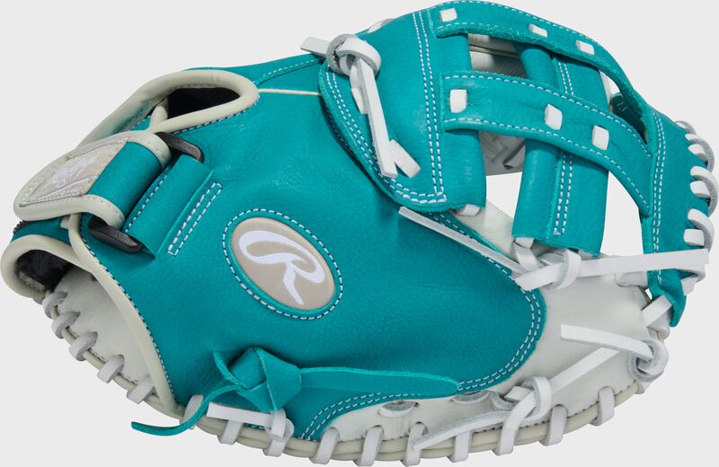 Thumb of a white/teal Shut Out 31.5-inch Fastpitch Softball Catcher's Mitt